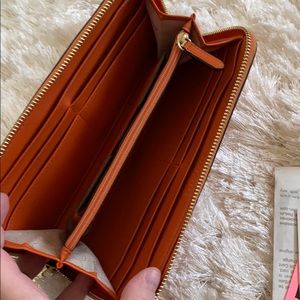 Michael Kors Bags - Michael Kors Orange Large Wallet Michael Kors Bags - Michael Kors Orange Large Wallet